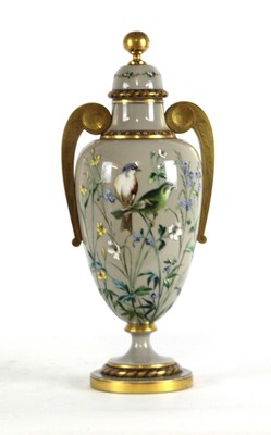 Lot 174 - A late Victorian opaline glass vase and cover...