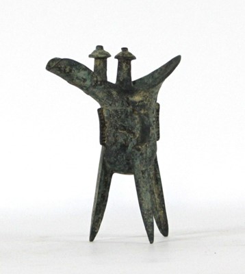 Lot 180 - A brown patinated Chinese ritual wine vessel...