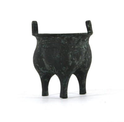 Lot 181 - A Chinese cast-metal and brown patinated...