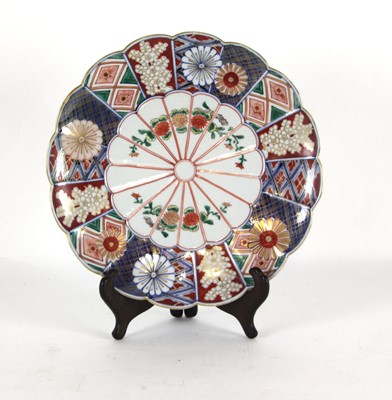 Lot 196 - A Japanese cabinet plate decorated with...
