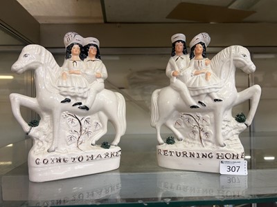 Lot 307 - Two Staffordshire style flat back figurines...