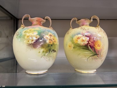 Lot 314 - Two Doulton Burslam twin handled vases with...