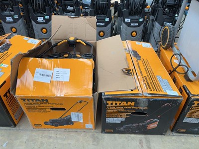 Lot 2486 - 2 Boxed Titan 1700w electric hand propelled...