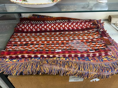 Lot 318 - An eastern woollen throw, an eastern wall...