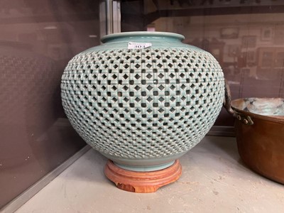Lot 303 - A late Victorian pierced blue ceramic vase on...