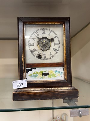 Lot 333 - A stained wood American style mantle clock