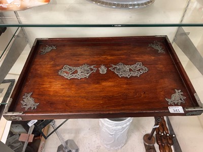 Lot 341 - A stained wood and white metal oriental tray...