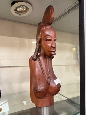 Lot 353 - An African carved teak bust of a lady
