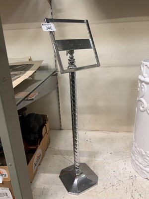 Lot 346 - A chrome music stand with twist column