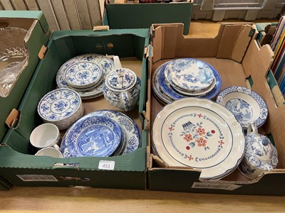 Lot 451 - Two trays of blue and white ceramics from...