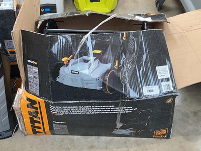 Lot 2488 - Boxed Titan electric raker and scarifier