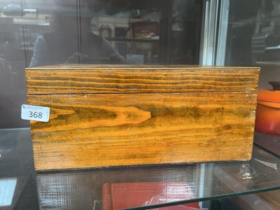 Lot 368 - A stained wooden sewing box with contents to...