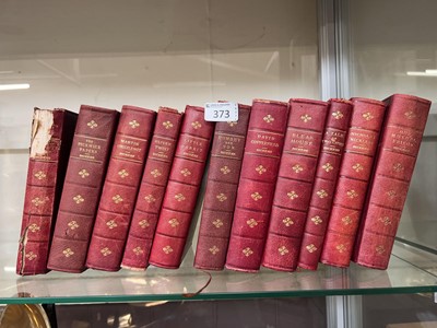 Lot 373 - A collection of eleven Charles Dickens books,...