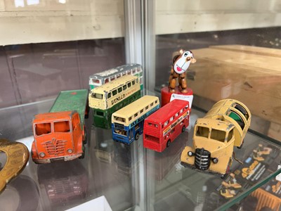 Lot 375 - A small collection of vintage toys to include...
