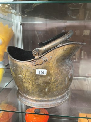 Lot 376 - A weathered brass coal bucket