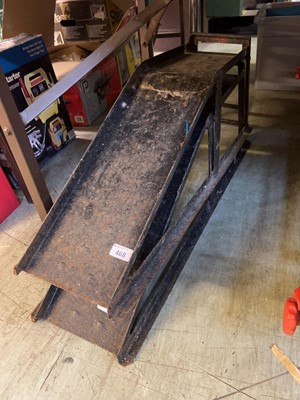 Lot 468 - A pair of weathered metal car ramps