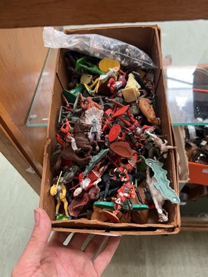 Lot 395 - A box containing a quantity of plastic figures...