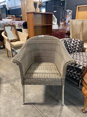 Lot 1062 - Wicker effect tub shaped armchair
