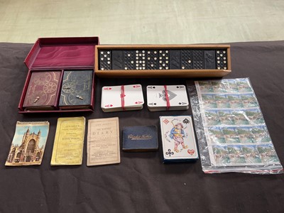 Lot 402 - A box containing an assortment of games and...