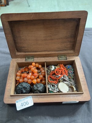 Lot 406 - A carved eastern jewellery box containing...