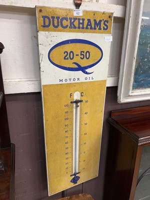 Lot 62 - A metalwork advertising thermometer for...