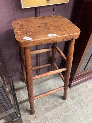Lot 63 - An early 20th century rustic oak stool