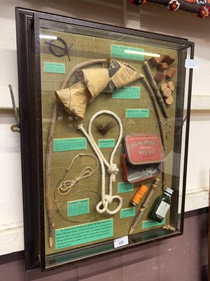 Lot 68 - A wall mounted display depicting items...