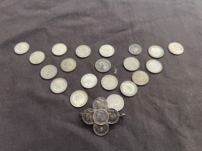 Lot 414 - A box containing a quantity of white metal...