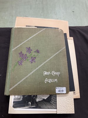 Lot 419 - A Victorian postcard album containing assorted...