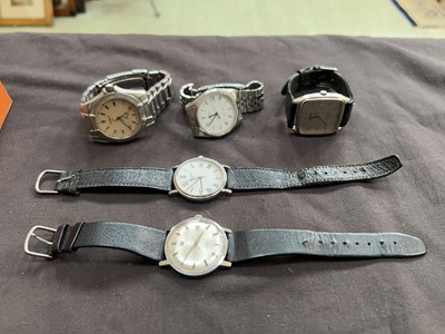 Lot 422 - Five Tissot wristwatches in a tan leatherette...