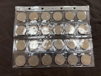 Lot 424 - A plastic sheet of twenty-four crowns