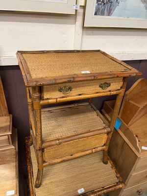 Lot 74 - A bamboo and wicker side table with drawer and...