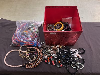 Lot 433 - A box containing an assortment of costume...