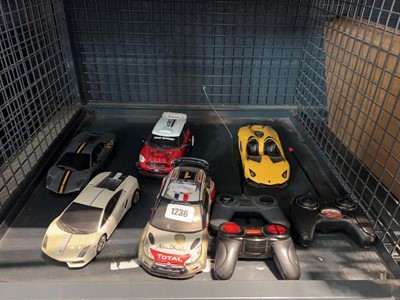 Lot 1236 - Cage of mixed RC cars to include Lamborghini,...