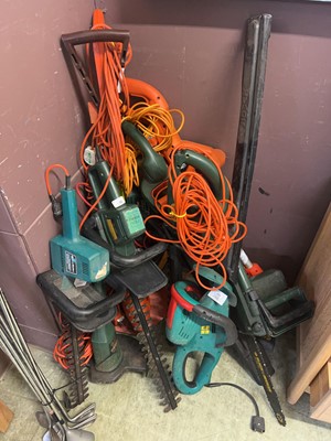 Lot 146 - A large assortment of electric garden tools to...