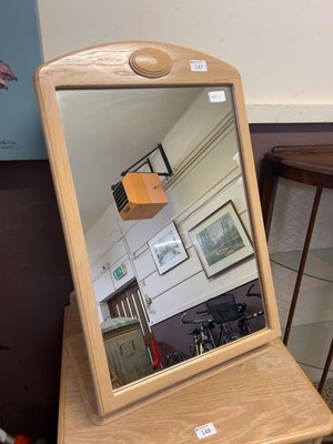 Lot 147 - A modern limed oak effect swing mirror
