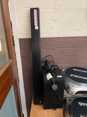 Lot 6 - An LG soundbar and subwoofer