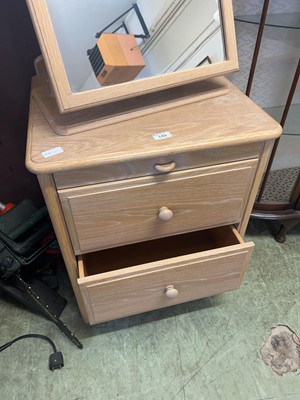 Lot 148 - A modern limed oak effect two drawer bedside...