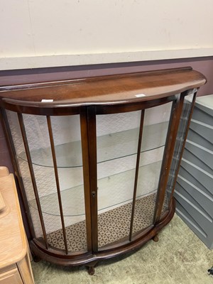 Lot 149 - A 20th century mahogany bow front glazed...