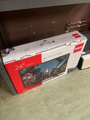Lot 9 - A boxed RCA 24" HD television (unchecked)