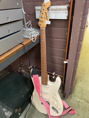 Lot 11 - A Legend white stratocaster-style electric guitar