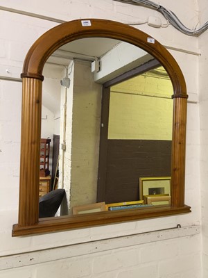 Lot 31 - A waxed pine framed over-mantle mirror
