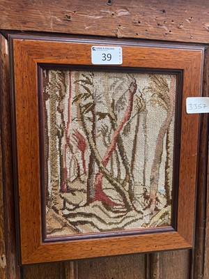 Lot 39 - An oak framed woolwork depicting wooded scene