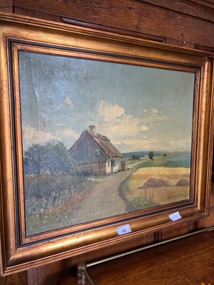 Lot 48 - A gilt framed oil on canvas depicting coastal...