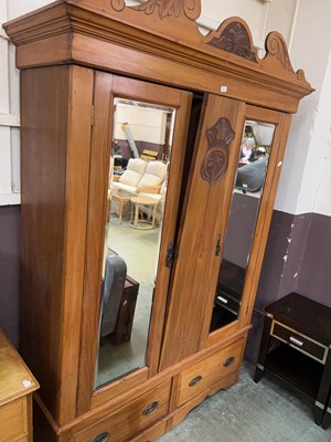 Lot 86 - A late-Victorian stained pine wardrobe, with...