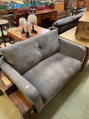 Lot 89 - A modern grey-upholstered two-seater sofa