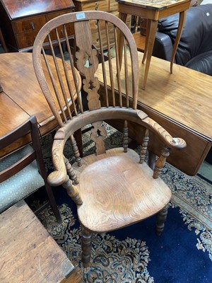 Lot 101 - A 20th-Century oak hoop-back Windsor-style chair