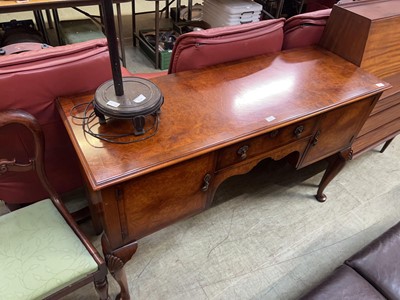 Lot 115 - A 20th-century mahogany veneered sideboard...