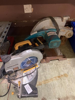Lot 169 - An Evolution multi-purpose mitre saw along...
