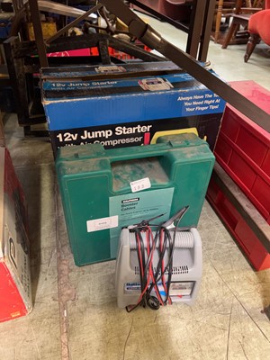 Lot 182 - A boxed 12v jumpstarter with air compressor,...
